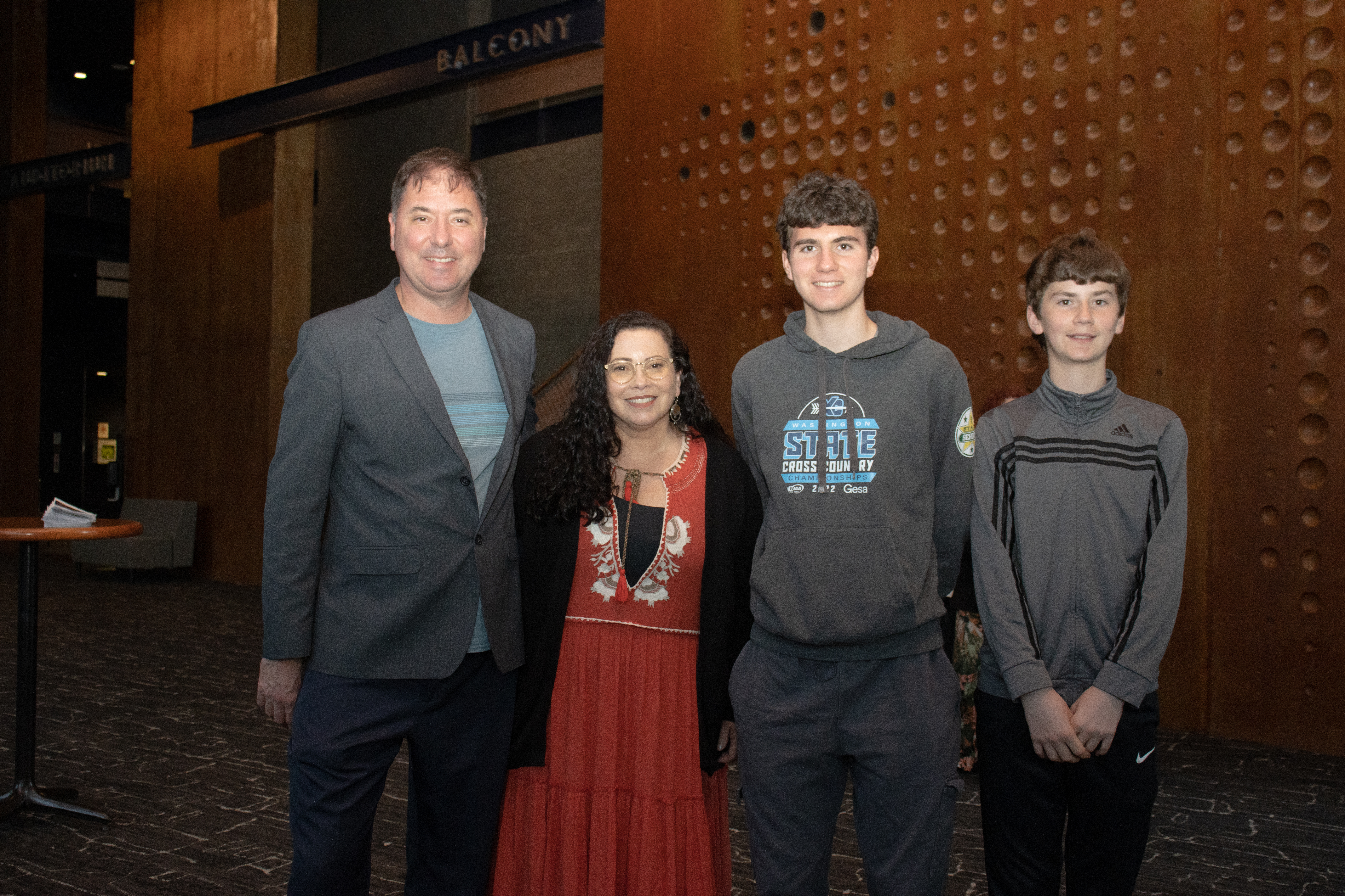 author poses with teacher 