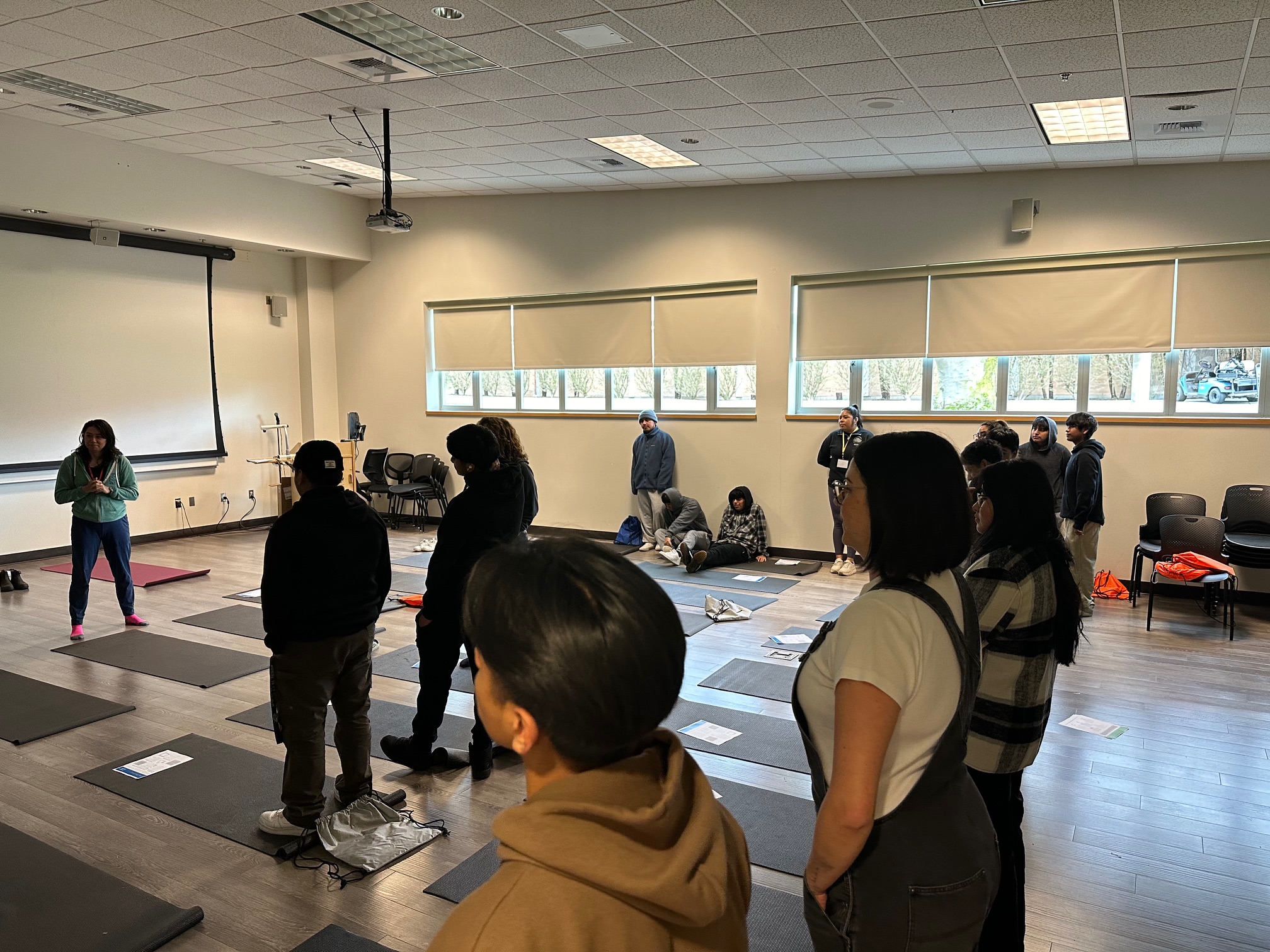 students doing yoga